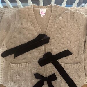 So Me Tan Knitwear. Velvet bows
